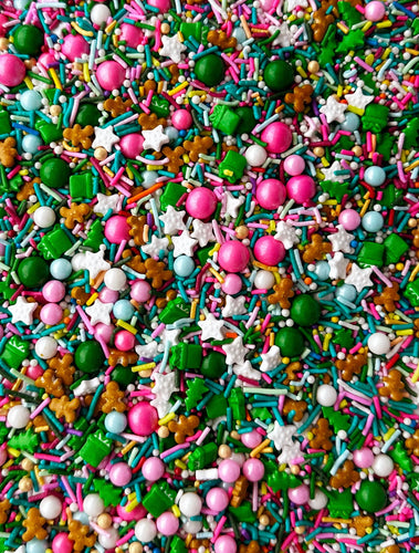 VARIETY CHRISTMAS SPRINKLES PINK LIGHT PINK GREEN, YELLOW, WHITE, LIGHT BLUE, GOLD. TREE SHAPED PRESENTS RODS AND ROUND SHAPED.