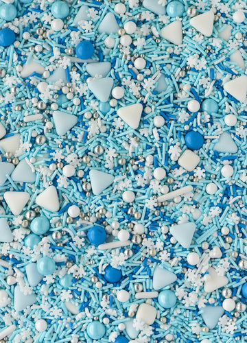 ICE THEMED SPRINKLES WITH SHADES OF BLUE AND WHITE. INLCUDING SNOWFLAKE TRIANGLE RODS AND ROUND SHAPED SPRINKLES