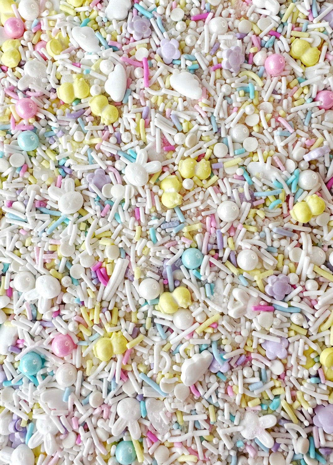 Pastel coloured Easter Themed Sprinkles including duck shaped, round and bunny shaped